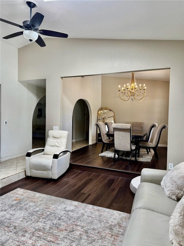 2285 W 2nd Ave, San Bernardino, CA 92407 - living room featuring arched walkways, wood finished floors, baseboards, and a chandelier