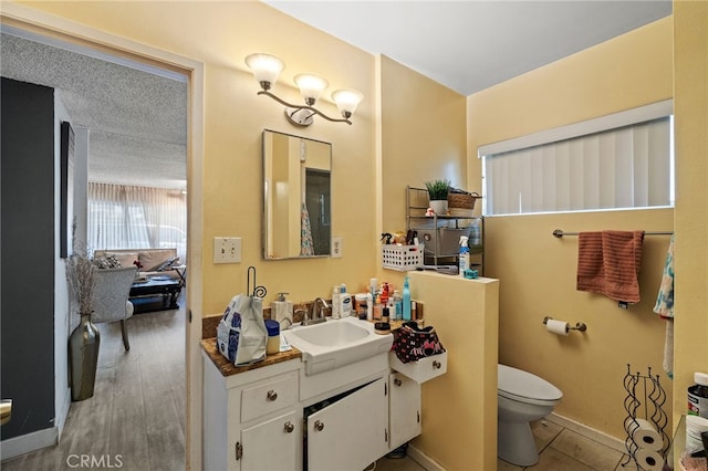 10139 Hayvenhurst Ave, North Hills, CA 91343 - bathroom with toilet and vanity