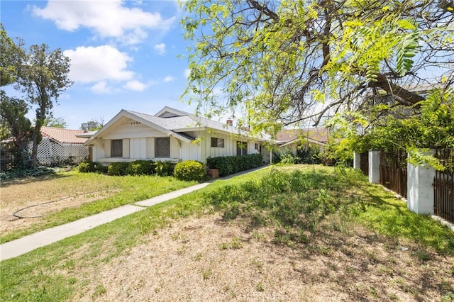 10139 Hayvenhurst Ave, North Hills, CA 91343 - view of front of property with board and batten siding and fence