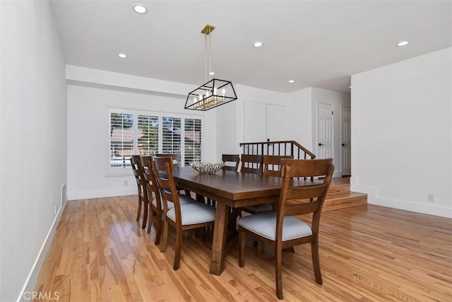 dining area with baseboards, recessed lighting, and light wood-style flooring