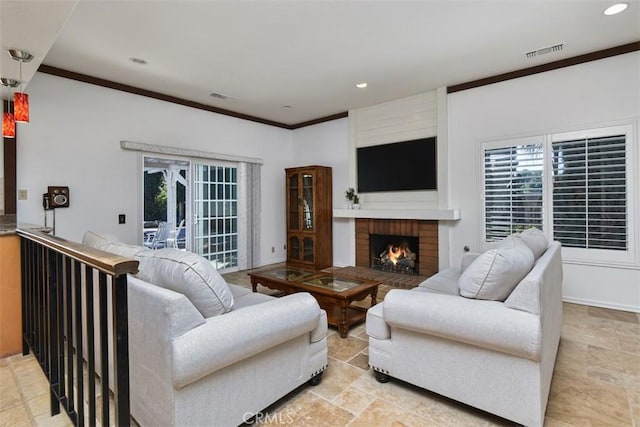 living room featuring visible vents, recessed lighting, and a fireplace