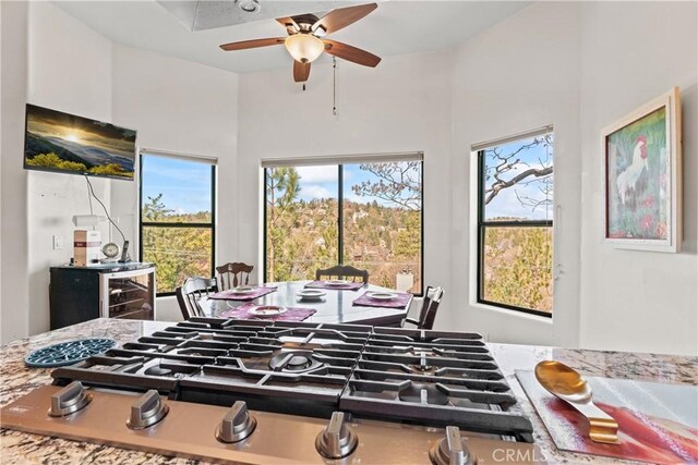 1305 Montreal Dr, Lake Arrowhead, CA 92352 - interior space with ceiling fan, stainless steel gas stovetop, and a high ceiling