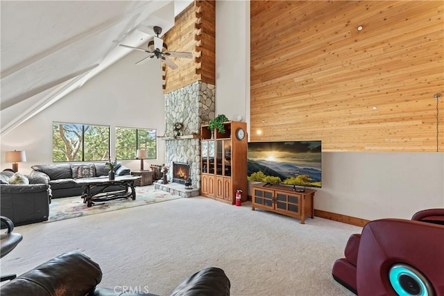 1305 Montreal Dr, Lake Arrowhead, CA 92352 - living room with ceiling fan, a fireplace, carpet floors, high vaulted ceiling, and baseboards