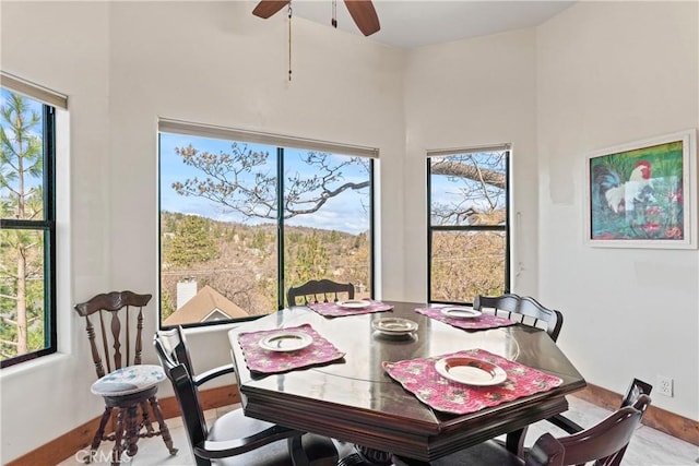 1305 Montreal Dr, Lake Arrowhead, CA 92352 - dining room with baseboards, a ceiling fan, and a towering ceiling