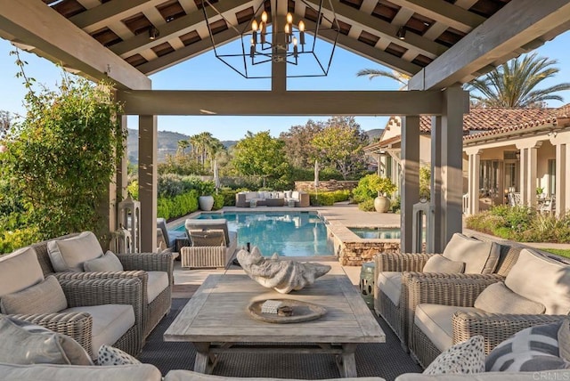 view of patio with an outdoor pool and an outdoor hangout area