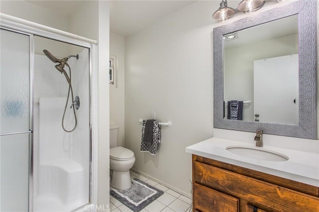 full bathroom with vanity, toilet, baseboards, tile patterned floors, and a shower stall
