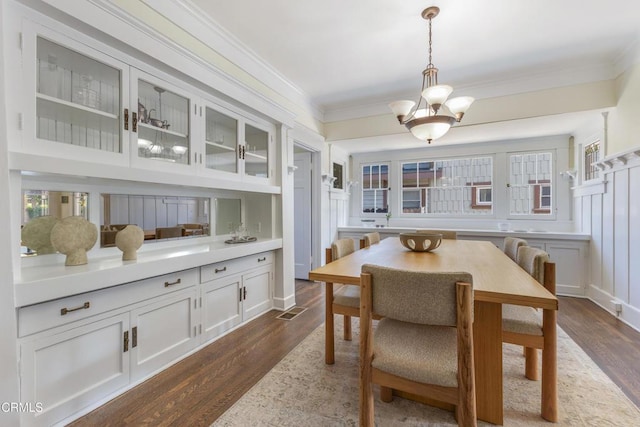 1954 Primrose Ave, South Pasadena, CA 91030 - dining room with dark wood-type flooring, a chandelier, and ornamental molding