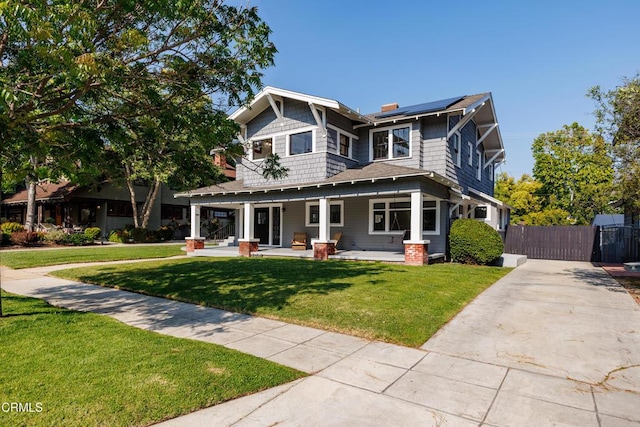 1954 Primrose Ave, South Pasadena, CA 91030 - craftsman-style home featuring roof mounted solar panels, a porch, concrete driveway, and a gate