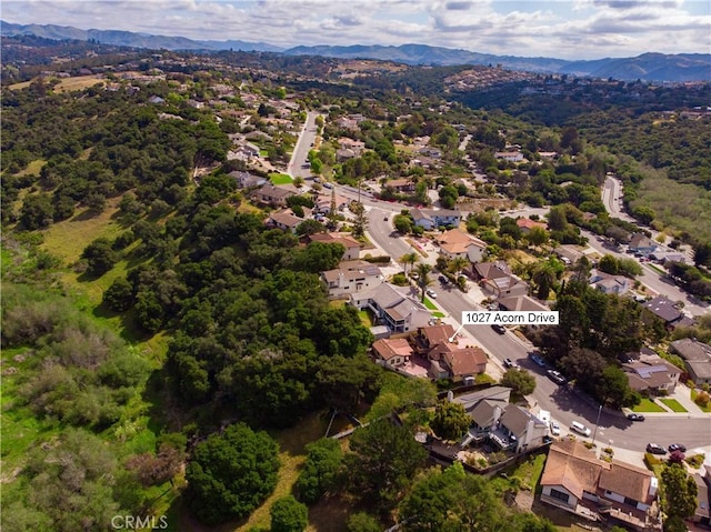 bird's eye view featuring a residential view and a mountain view