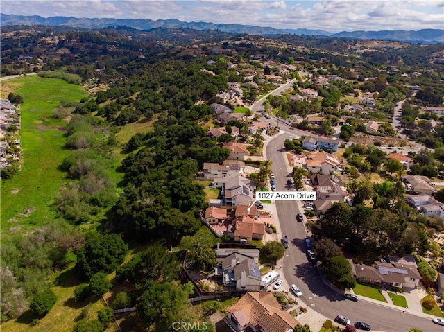 aerial view featuring a residential view and a mountain view