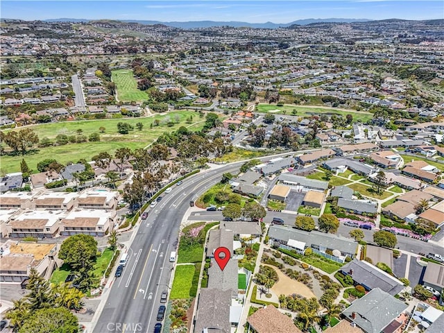 birds eye view of property with a residential view and a mountain view