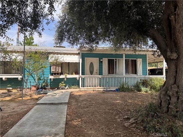6735 Merito Ave, San Bernardino, CA 92404 - view of front of property with a porch