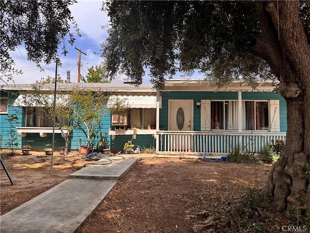 6735 Merito Ave, San Bernardino, CA 92404 - view of front of house featuring a porch