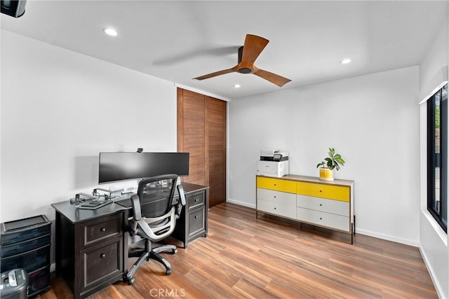 home office with baseboards, recessed lighting, ceiling fan, and wood finished floors