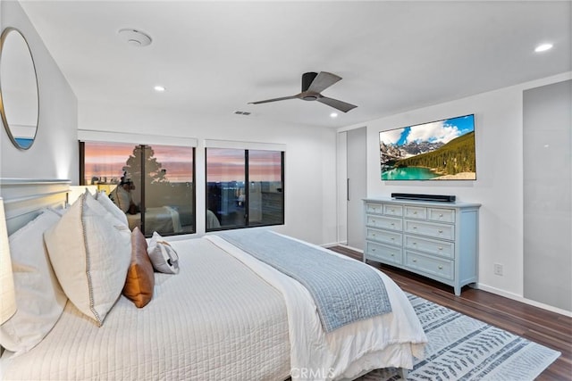 bedroom with baseboards, recessed lighting, dark wood-style flooring, and visible vents