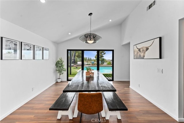 dining space featuring visible vents, recessed lighting, lofted ceiling, and wood finished floors