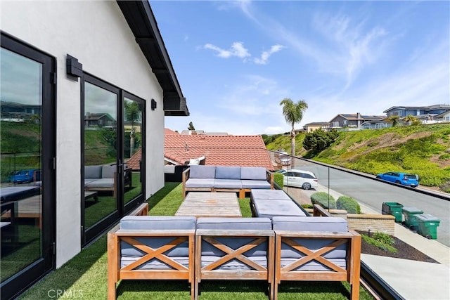 balcony featuring an outdoor living space