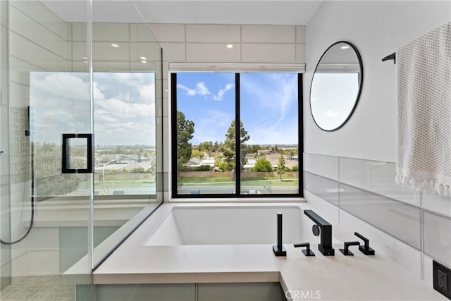 bathroom with plenty of natural light