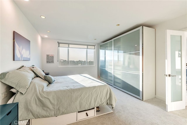 bedroom featuring carpet and recessed lighting
