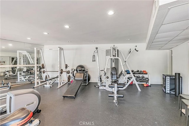 workout area with recessed lighting