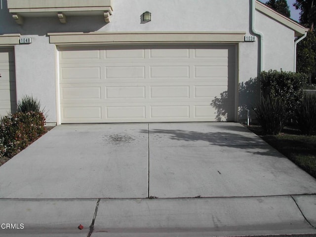 garage with driveway