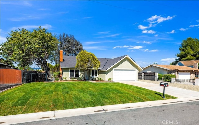 ranch-style house featuring a front yard, a garage, fence, concrete driveway, and stucco siding