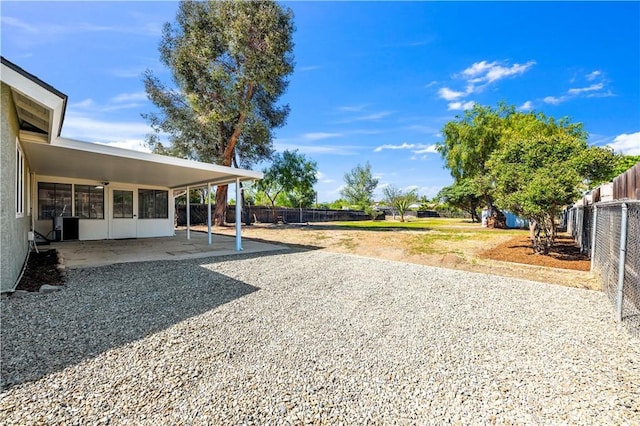 view of yard featuring a fenced backyard and a patio area