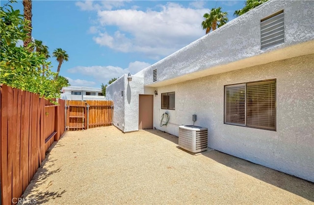 69645 Antonia Way, Rancho Mirage, CA 92270 - view of yard with central AC unit and a patio