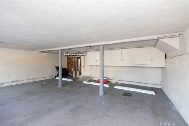 basement with a textured ceiling