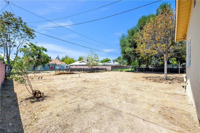 view of yard with fence