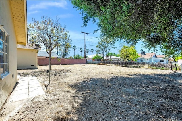 view of yard with fence