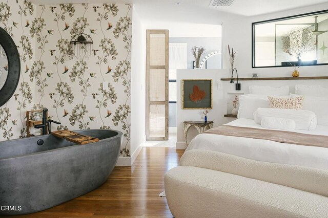 1241 Solita Rd, Pasadena, CA 91103 - bedroom featuring baseboards, multiple windows, wallpapered walls, and wood finished floors
