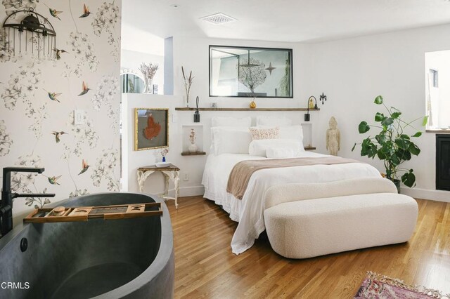 1241 Solita Rd, Pasadena, CA 91103 - bedroom with baseboards, wood finished floors, and visible vents