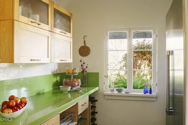 1241 Solita Rd, Pasadena, CA 91103 - kitchen with plenty of natural light, light countertops, and glass insert cabinets