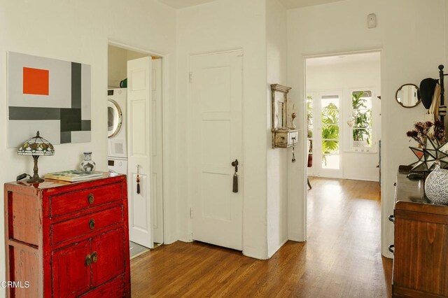 1241 Solita Rd, Pasadena, CA 91103 - corridor with wood finished floors and stacked washer / dryer