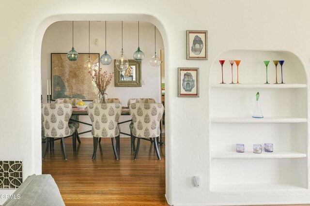 1241 Solita Rd, Pasadena, CA 91103 - living area featuring arched walkways and wood finished floors