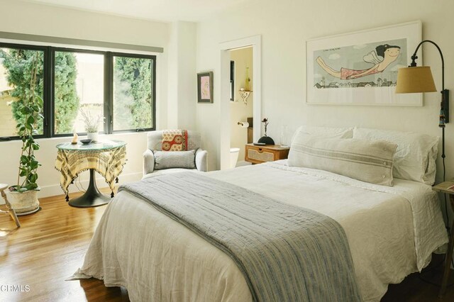 1241 Solita Rd, Pasadena, CA 91103 - bedroom featuring baseboards and wood finished floors