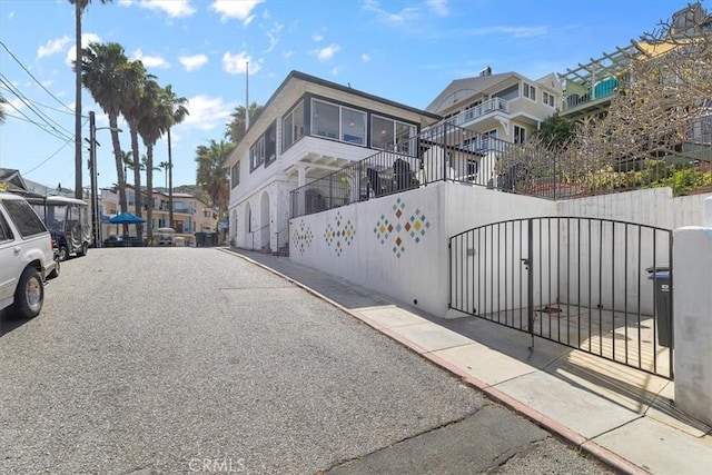 117 Maiden Ln, Avalon, CA 90704 - view of road with a residential view, a gate, and sidewalks