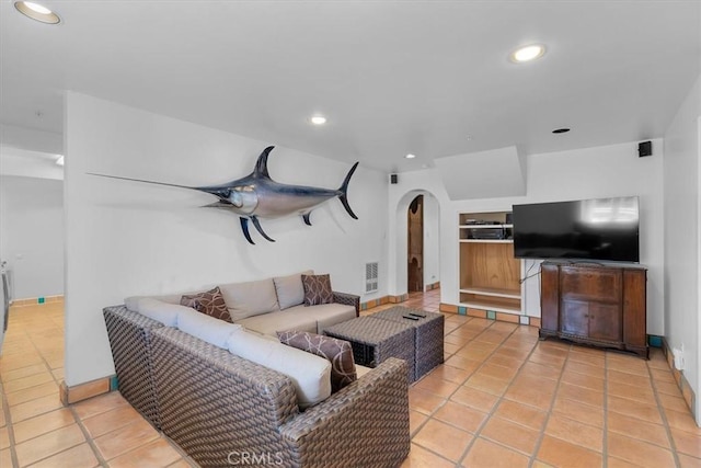 117 Maiden Ln, Avalon, CA 90704 - living area with visible vents, arched walkways, light tile patterned floors, and recessed lighting