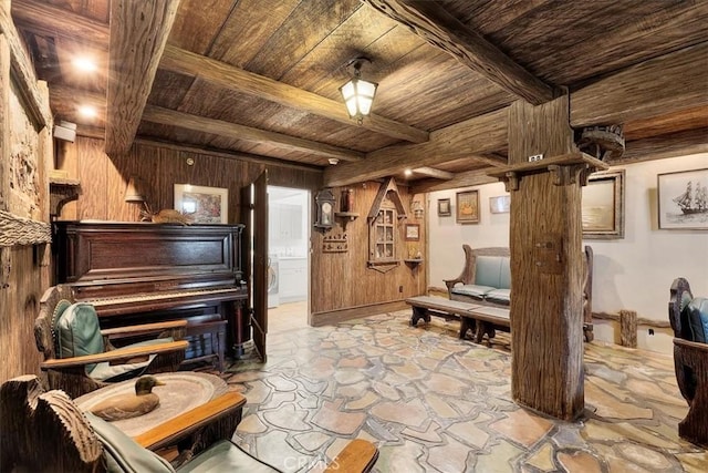 117 Maiden Ln, Avalon, CA 90704 - living area with washer / dryer, wood ceiling, stone finish floor, and beam ceiling
