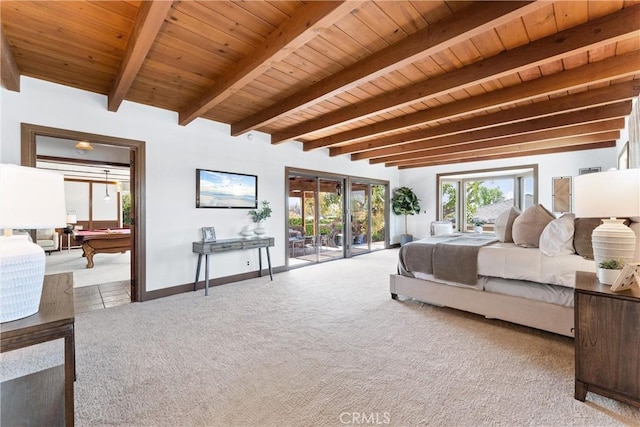 carpeted bedroom with access to outside, baseboards, wooden ceiling, and beam ceiling