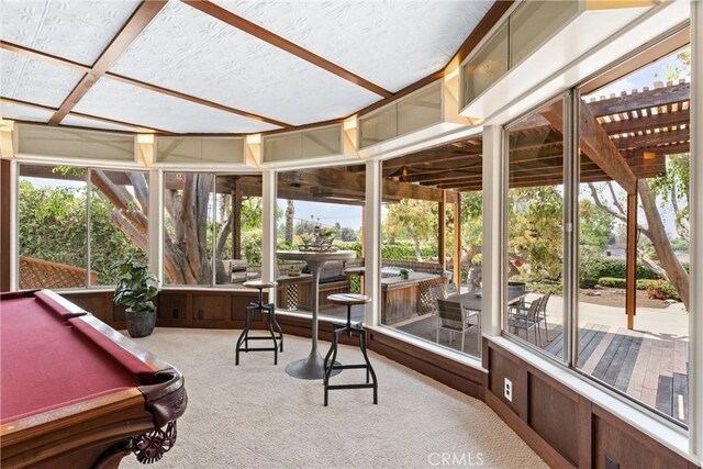 sunroom / solarium with billiards