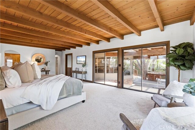 carpeted bedroom featuring access to outside, arched walkways, wood ceiling, and beam ceiling
