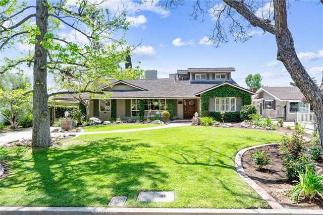 view of front of home with a front yard