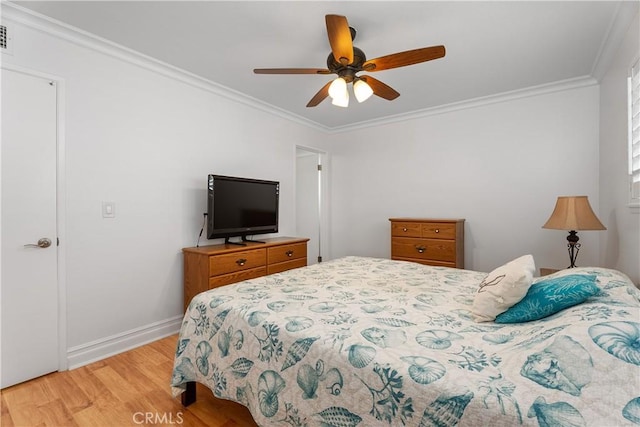 19822 Westwinds Ln, Huntington Beach, CA 92646 - bedroom with light wood-type flooring, ornamental molding, baseboards, and ceiling fan