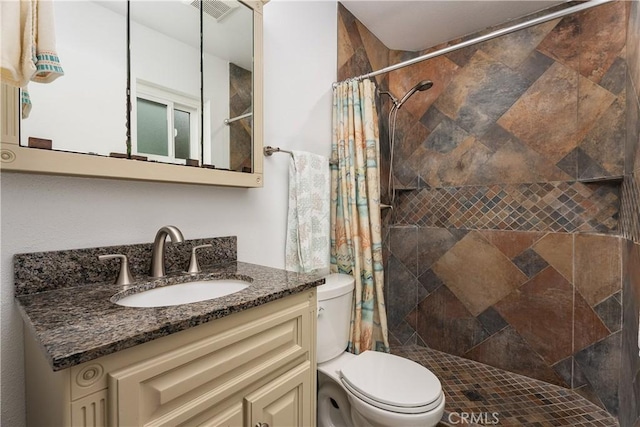 19822 Westwinds Ln, Huntington Beach, CA 92646 - full bath with visible vents, a tile shower, toilet, and vanity