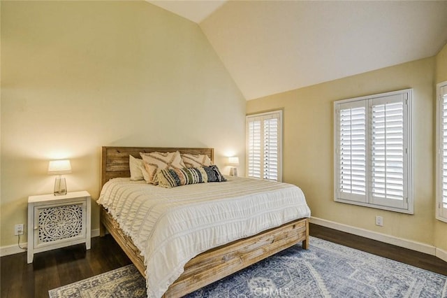 166 N Singingwood St Unit 9, Orange, CA 92869 - bedroom featuring baseboards, vaulted ceiling, and wood finished floors