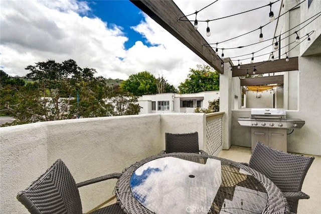 166 N Singingwood St Unit 9, Orange, CA 92869 - balcony featuring outdoor dining area and area for grilling