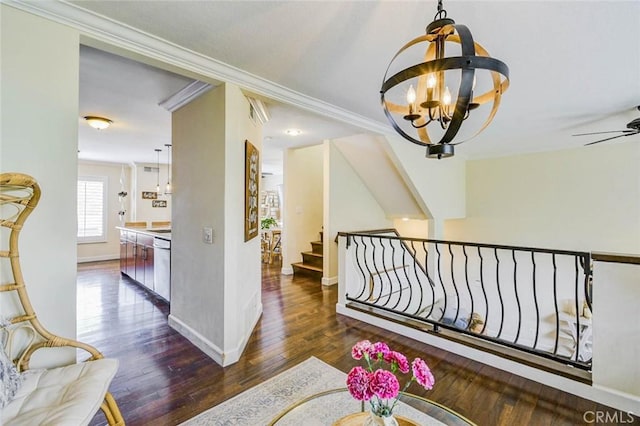 166 N Singingwood St Unit 9, Orange, CA 92869 - hallway with an inviting chandelier, ornamental molding, wood-type flooring, and baseboards