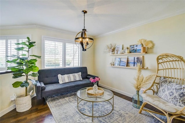 166 N Singingwood St Unit 9, Orange, CA 92869 - living room featuring an inviting chandelier, baseboards, ornamental molding, and wood finished floors